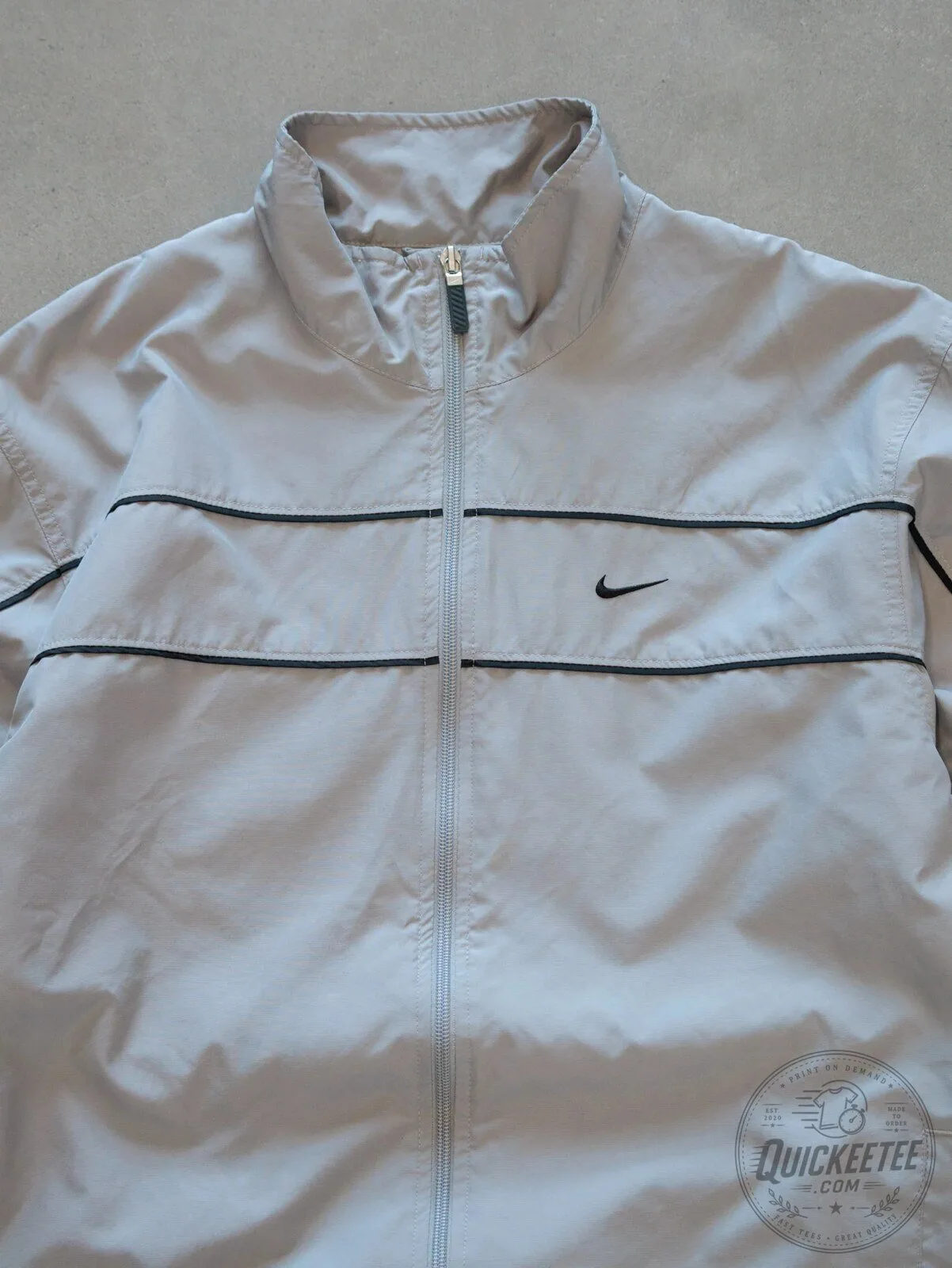Vintage Nike Gray Windbreaker Jacket with Black Stripes and Zipper Closure 13 Vintage Nike Gray Windbreaker Jacket with Black Stripes and Zipper Closure