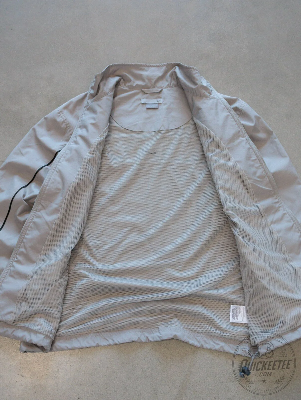 Vintage Nike Gray Windbreaker Jacket with Black Stripes and Zipper Closure 15 Vintage Nike Gray Windbreaker Jacket with Black Stripes and Zipper Closure
